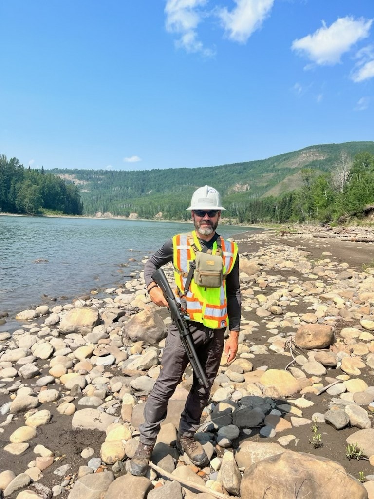 Wildlife monitor conducting survey in the field